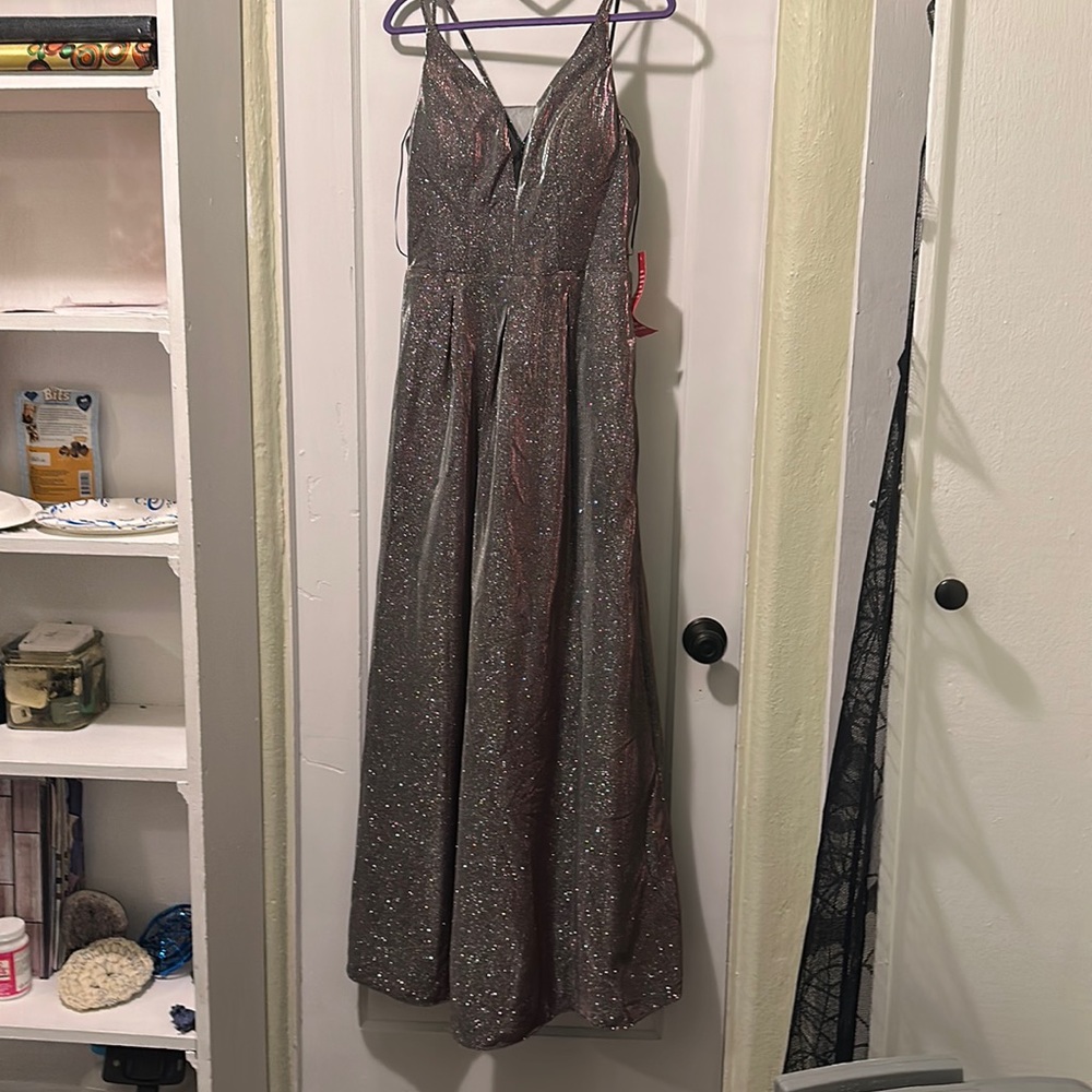Lovely chrome (silver/pink) strappy dress for formal occasion. New & never worn!